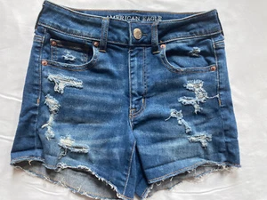 American Eagle Sz 2 Womens Shorts Destroyed Holes Cut Off Blue Hi-Rise Shortie - Picture 1 of 6