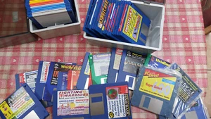 AMIGA Floppy Disk Collection - Sold with cases as Untested - Photo 1/4