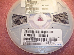 QTY (2000) NL322522T-100J TDK 1210 10uH GEFORMTE SMD INDUKTIVITÄTEN NL1210-100J - Bild 1 von 1