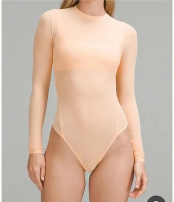 Lululemon Nulu Mesh Long-Sleeve Crewneck Bodysuit in Peach Bellini Medium New - Image 1 of 4