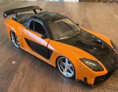 Jada Toys Fast and Furious Han's Mazda RX-7 Orange Black, 1:24 Scale - Image 1 of 4
