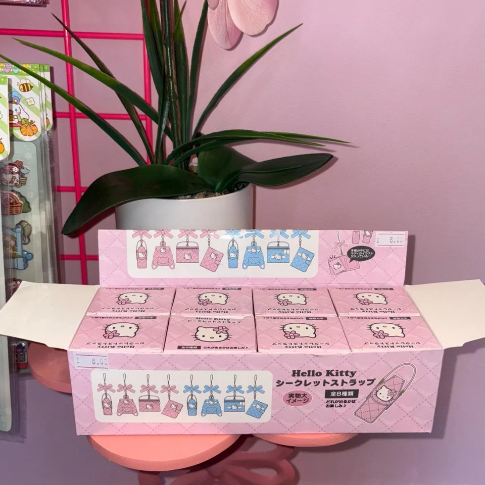 Sanrio Hello Kitty Pink and Blue Angel Mini Phone Charms Blind Box - Image 1 of 1