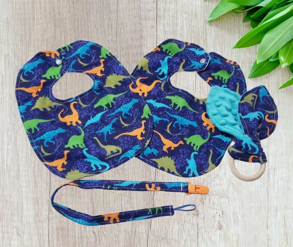 Conjunto de presente bebê dinossauro suporte Binkie, taggie, brinquedo para orelha de dentição conjunto com 4 peças - Imagem 1 de 1