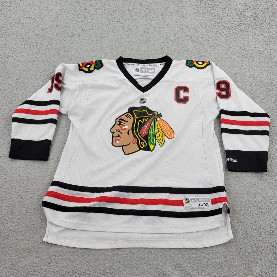 Camiseta deportiva de los Chicago Blackhawks 19 punteras para niños grande/XL Reebok con cuello en V para jóvenes Foto 1 de 4