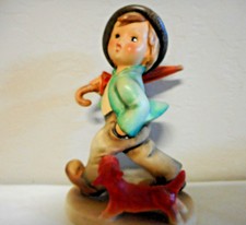 hummel boy with umbrella and dog