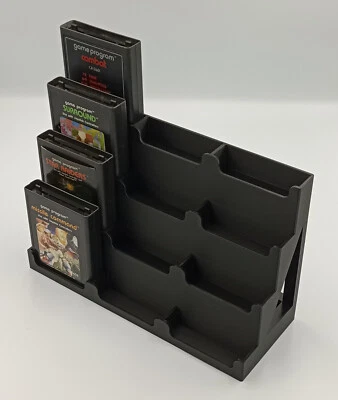 Estuche con soporte de torre de exhibición de cartuchos Atari 2600 - Tiene capacidad para 12 juegos Foto 1 de 4