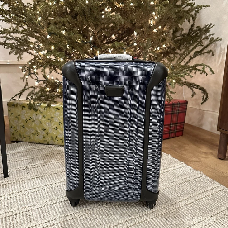 TUMI Vapor International 22" Carry-On Hard Shell Luggage | | Blue