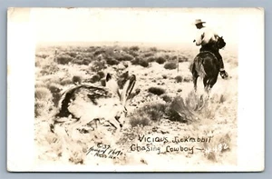 EXAGGERATED JACKRABBIT CHASING COWBOY ANTIQUE REAL PHOTO POSTCARD RPPC - Imagen 1 de 2