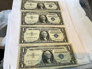 FOUR (4) UNCIRCULATED UNITED STATES SILVER CERTIFICATE SERIES 1957 $1.00 BILLS - Picture 1 of 17