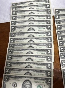 25 $2 Dollar Bills Consecutivly Numberd Uncirculated Slightly Cut Off Center - Picture 1 of 5