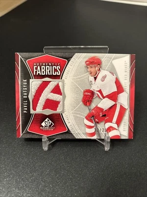 2009-10 UD SP Game Used Pavel Datsyuk Authentic Fabrics Emblem Logo Patch 23/35 - Image 1 of 2