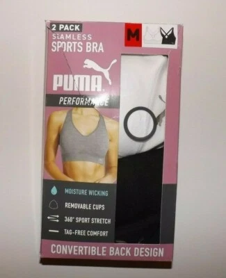 Lote de 2 sujetadores deportivos PUMA para mujer negro blanco absorbente rendimiento sin costuras S nuevo en caja Foto 1 de 2