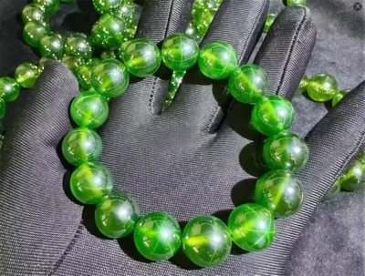 Top Green Star Sapphire Lab-created Round Beads Sapphire Elastic rope Bracelet - Image 1 of 4