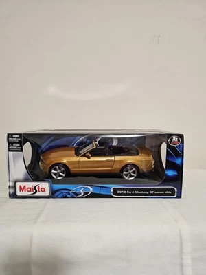 Maisto 1:18 2010 Ford Mustang GT кабриолет золото  - Изображение 1 из 4