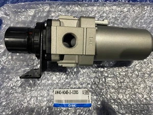SMC: AW40-N04B-2-X2185: REGULADOR FILTRO AIRE COMP: SET@ 0.05-0.4MPa - Imagen 1 de 7