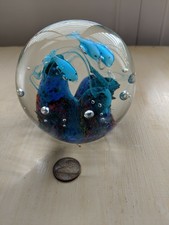 Glass dolphin paperweight