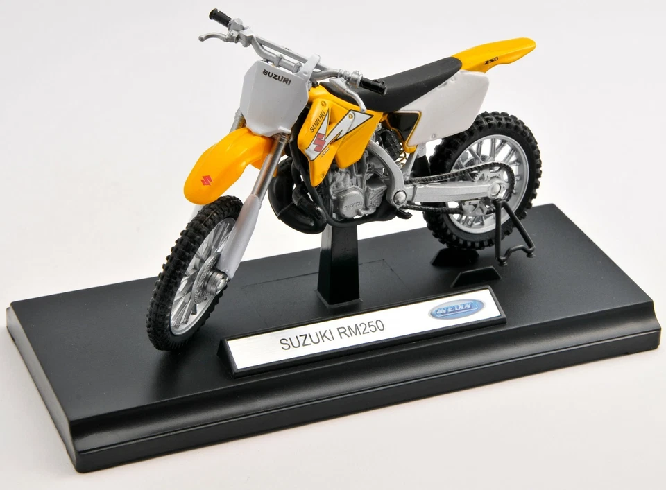 BLITZ VERSAND Suzuki RM 250 gelb / yelow Welly Motorrad Modell 1:18 NEU & OVP  - Bild 1 von 1