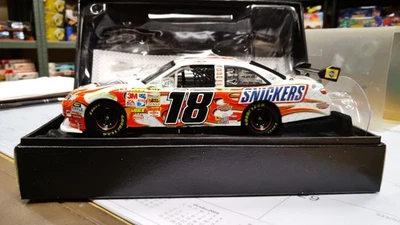 KYLE BUSCH #18 SNICKERS 2009 CAMRY ELITE AUTOGRAPHED EDITION - Image 1 of 4