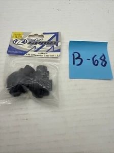 Team Losi LOSB3530 F/R Differential Case Set LST, MUG - Picture 1 of 1