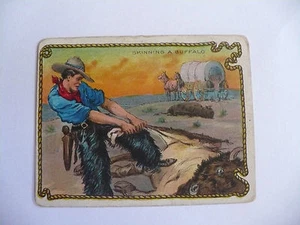 TABAKKARTEN HASSAN KORKSPITZE ZIGARETTEN COWBOY SERIE COWBOY ENTHÄUTEN EINEN BÜFFEL - Bild 1 von 1