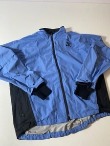 Chaqueta cortavientos Zero Restriction para hombre grande azul rendimiento golf - Imagen 1 de 10