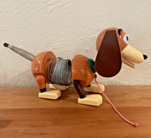 Disney Store Toy Story Talking Rolling Slink Dog Metal Slinky Pull- toy WORKS - Picture 1 of 6