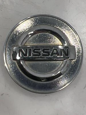 Tapa central de llanta de aleación Nissan para Juke Versa Rogue Sentra Quest OEM 40343AU51A Foto 1 de 2