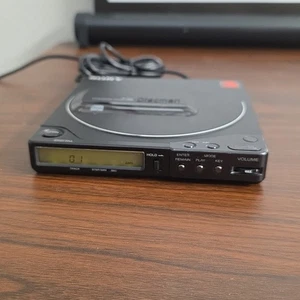 Reproductor de CD Sony D-25 Discman funciona con batería defectuosa solo con cable de alimentación L - Imagen 1 de 8