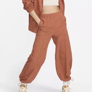 Nike Pantaloni Abbigliamento Sportivo Tutto Tessuto Donna Bruciato Sunrise Sail Orlo Aperto S - Foto 1 di 15