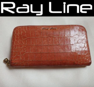 100% authentic  miumiu round long wallet orange enamel(USED) - Picture 1 of 8