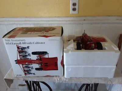 1/16 scale Ertl 1954 Farmall 400 with cultivator.  50th Anniversary NIB - Image 1 of 2