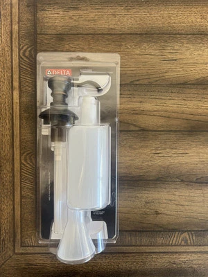 Dispensador de jabón/loción Delta. RP37039RB Bronce veneciano. Foto 1 de 3