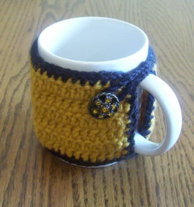 Hand Crochet Gold and Black Buttoned Coffee Mug Cozy - Picture 1 of 2