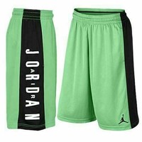 black and neon green nike shorts