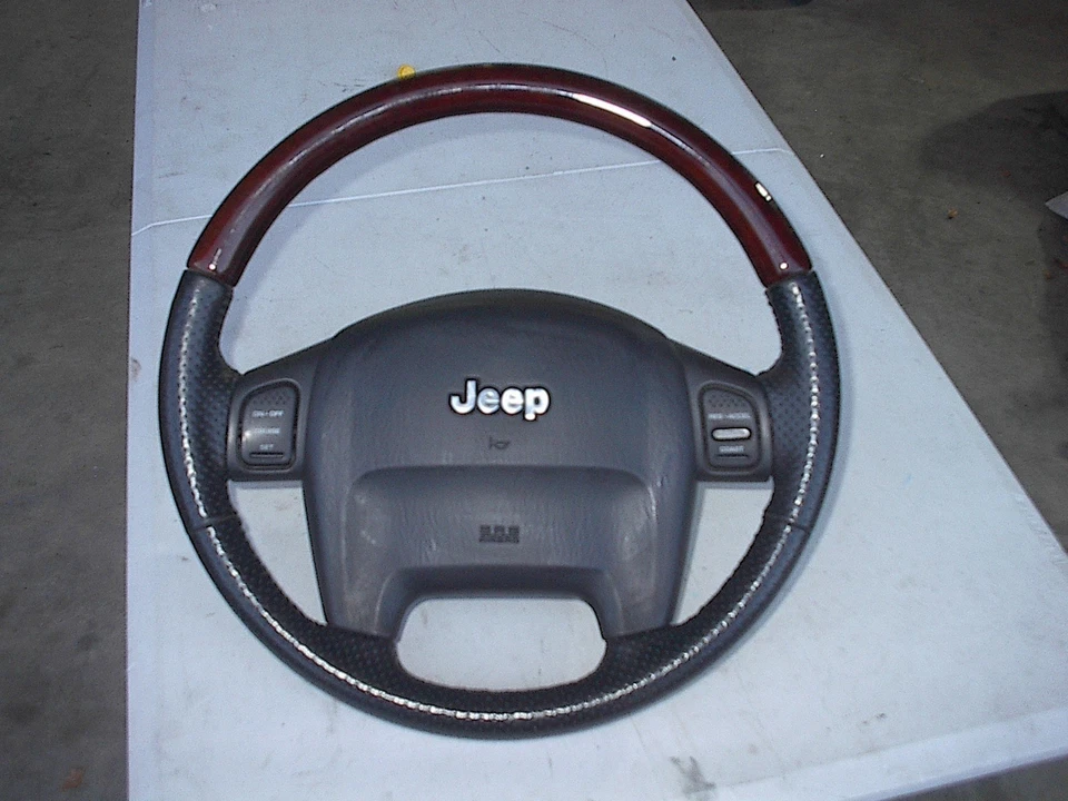 Jeep Grand Cherokee Overland wood leather Steering Wheel - Image 1 of 4