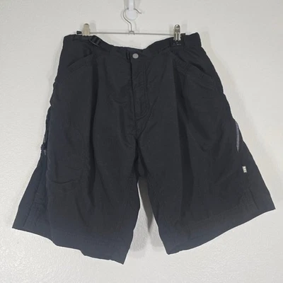 Shorts acolchoado masculino REI ciclismo médio preto externo bolsos frontais planos atléticos - Imagem 1 de 4