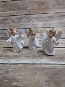 3 White Ceramic Angels Holding Gifts Ornaments Gold Accent Opalescent Wings - Picture 1 of 10