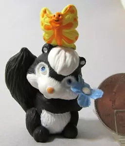 Hallmark Merry Miniature 1995 Skunk with Flower - Picture 1 of 6