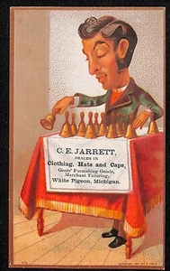 C.E. Jarrett Clothing Hats White Pigeon, MI Victorian Trade Card Man Rings Bells - Picture 1 of 2