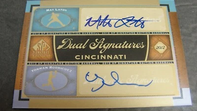 Alfombrilla SP Signature Edition 2012 doble firma Latos Yorman Rodriguez #CIN10 automática Foto 1 de 2