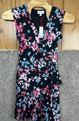 NUEVO CON ETIQUETAS~Elle Mujer Talla Mediana Sin Mangas Negro Floral Imitación Envoltura~Elástica Foto 1 de 4