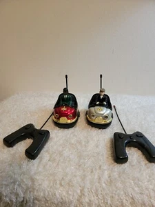 F.A.O. Schwarz Remote Control Bumper Car Set With White and Black Drivers TESTED - Picture 1 of 2