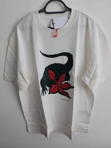 MAGLIETTA LACOSTE x STRANGER THINGS XL (TAGLIA 6) PANNA NUOVA CON ETICHETTE - Foto 1 di 13