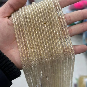 Cuentas de disco espaciador de rondelle micro facetadas de cuarzo limón natural genuino de 3x4 mm - Imagen 1 de 6