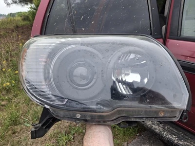 Faros proyectores negros con barra LED para Toyota 4Runner 2006-2009 Foto 1 de 4