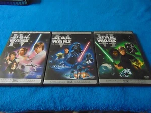 STAR WARS TRILOGY WITH BONUS MATERIAL 4-DVD DISC SET DIGITALLY MASTERED - Picture 1 of 13