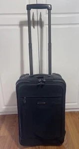DAKOTA by Tumi Black Ballistic Rolling Luggage 21” Upright Wheeled Suitcase - Picture 1 of 12