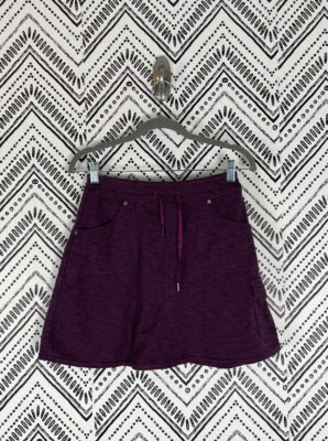 Falda corta Kuhl Mova talla Xs jaspeada baya púrpura negra cordón elástico exterior Foto 1 de 4