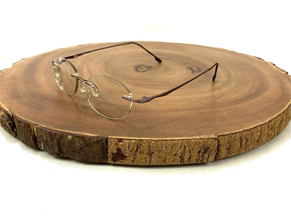 Monturas de gafas NIKON NC05 marrón sin montura 0805 titanio tamaño 140 mm Foto 1 de 4