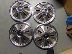 NICE USED 14" 66 FACTORY ORIGINAL WHEEL COVERS -GOOD CENTERS - Picture 1 of 3